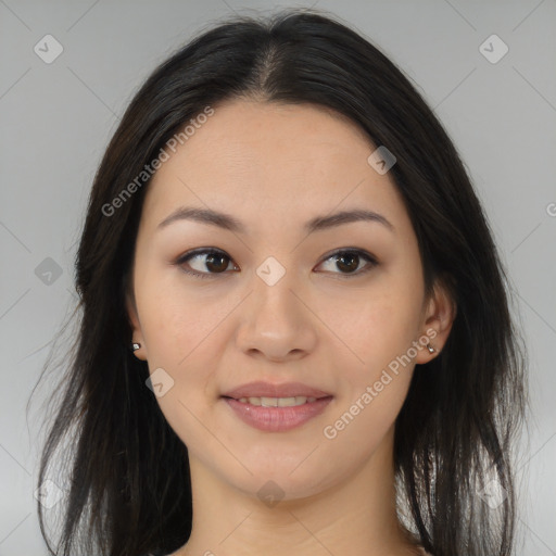 Joyful latino young-adult female with long  brown hair and brown eyes