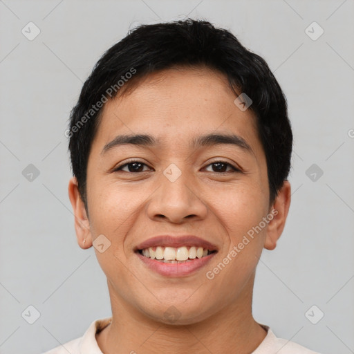 Joyful asian young-adult male with short  black hair and brown eyes