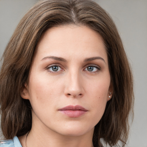 Neutral white young-adult female with medium  brown hair and grey eyes