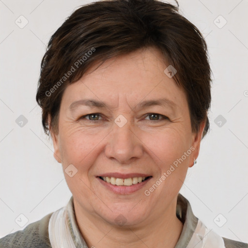 Joyful white adult female with medium  brown hair and grey eyes