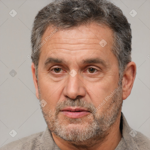 Joyful white middle-aged male with short  brown hair and brown eyes