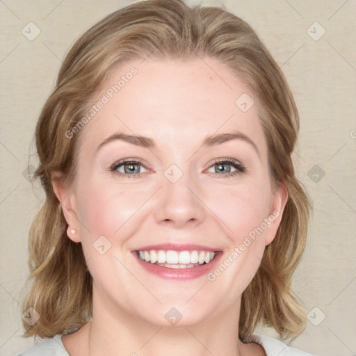 Joyful white young-adult female with medium  brown hair and blue eyes