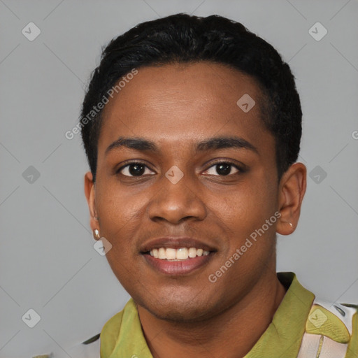 Joyful black young-adult male with short  black hair and brown eyes