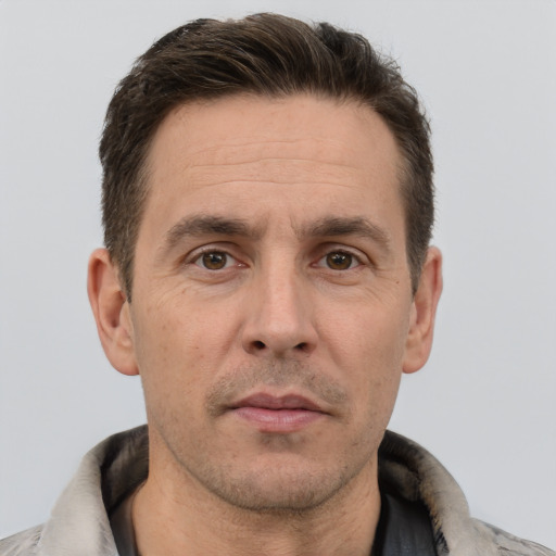 Neutral white adult male with short  brown hair and brown eyes