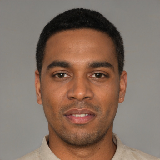 Neutral black young-adult male with short  black hair and brown eyes