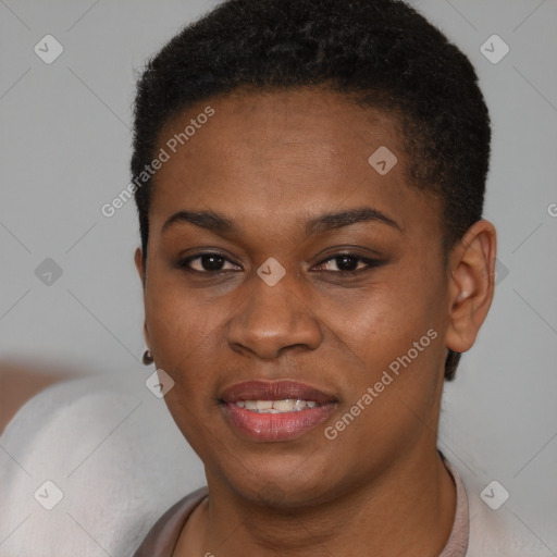 Joyful black young-adult female with short  brown hair and brown eyes