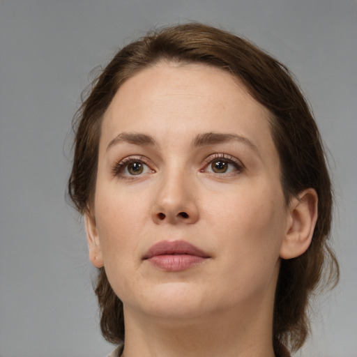 Neutral white young-adult female with medium  brown hair and brown eyes