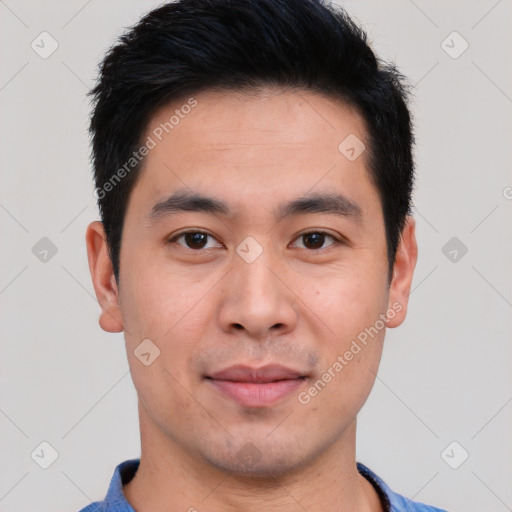 Joyful white young-adult male with short  black hair and brown eyes