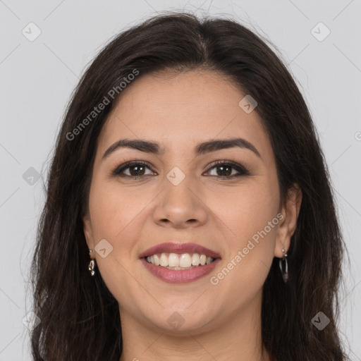 Joyful white young-adult female with long  brown hair and brown eyes