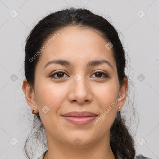 Joyful latino young-adult female with medium  brown hair and brown eyes