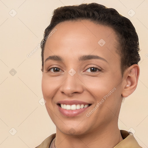 Joyful white young-adult female with short  brown hair and brown eyes