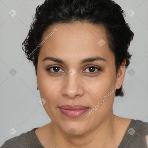 Joyful latino young-adult female with short  brown hair and brown eyes