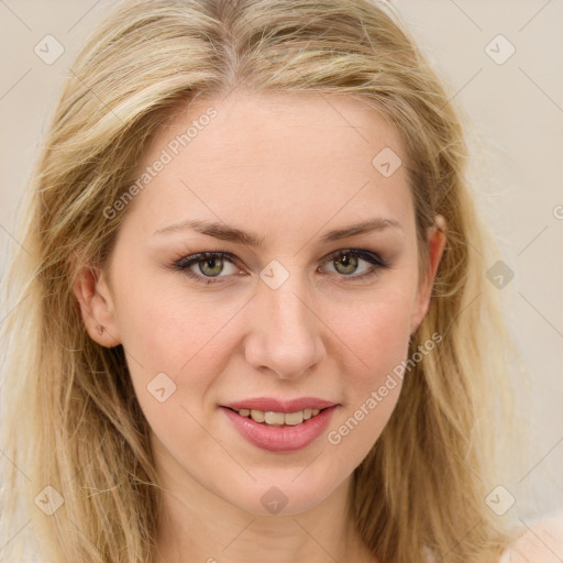 Joyful white young-adult female with long  brown hair and green eyes