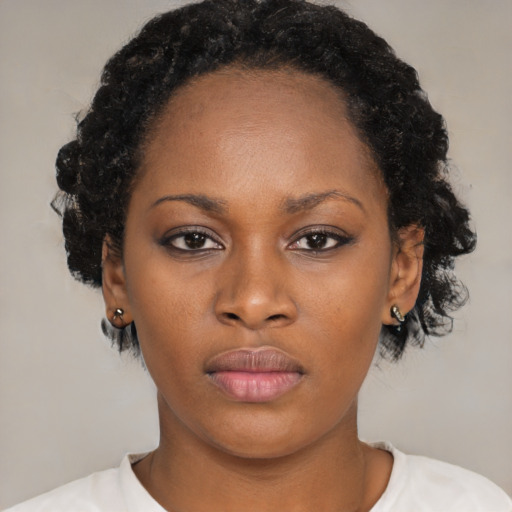 Neutral latino young-adult female with short  black hair and brown eyes