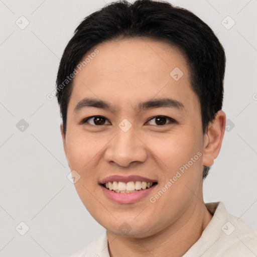 Joyful asian young-adult male with short  black hair and brown eyes