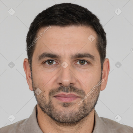 Neutral white adult male with short  black hair and brown eyes