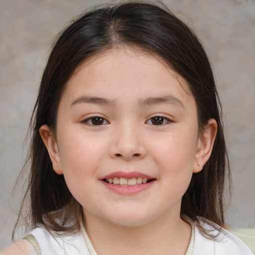 Joyful white child female with medium  brown hair and brown eyes