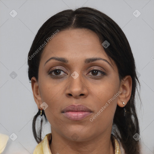 Joyful latino young-adult female with medium  brown hair and brown eyes