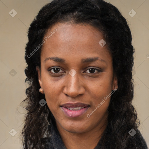 Joyful black young-adult female with long  black hair and brown eyes