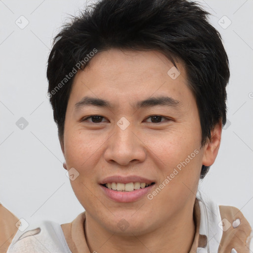 Joyful asian young-adult male with short  brown hair and brown eyes