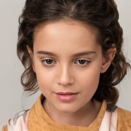 Joyful white child female with medium  brown hair and brown eyes