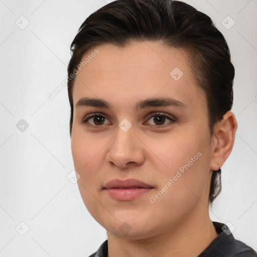 Joyful white young-adult female with short  brown hair and brown eyes