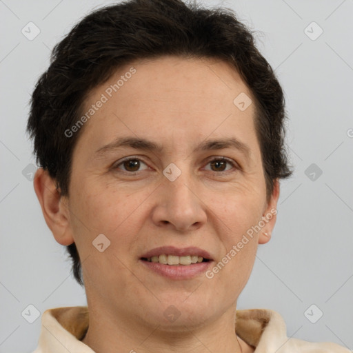 Joyful white adult female with short  brown hair and brown eyes