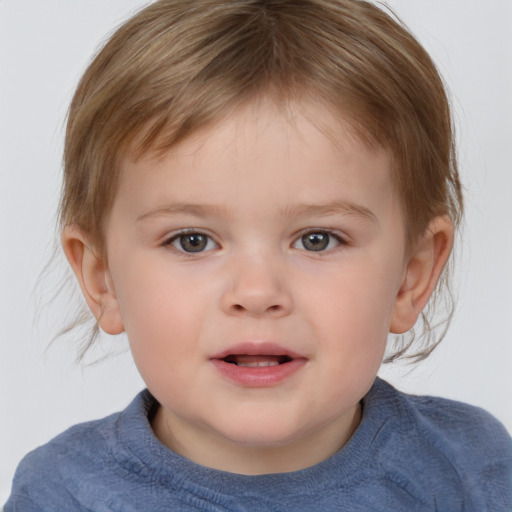 Joyful white child male with short  brown hair and brown eyes