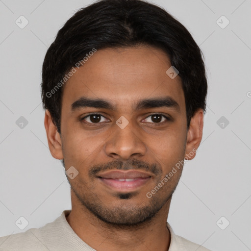 Joyful latino young-adult male with short  black hair and brown eyes