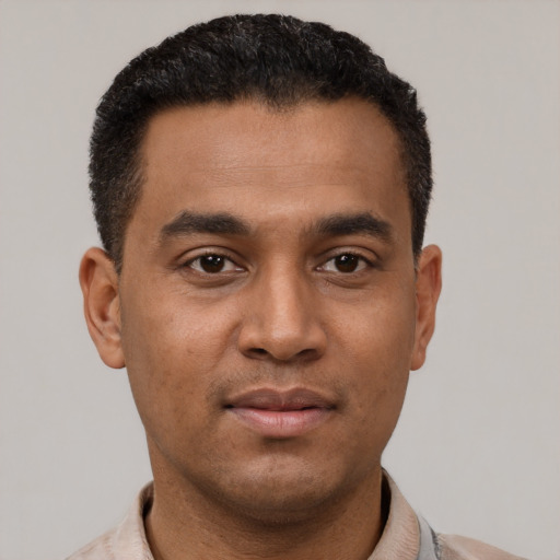 Neutral latino young-adult male with short  black hair and brown eyes