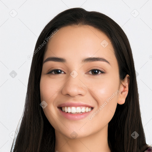 Joyful white young-adult female with long  black hair and brown eyes