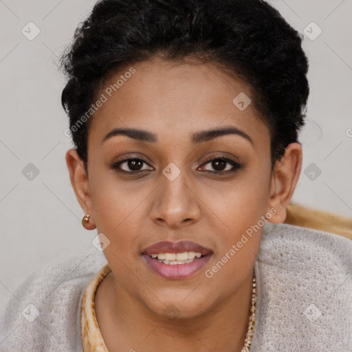 Joyful black young-adult female with short  brown hair and brown eyes