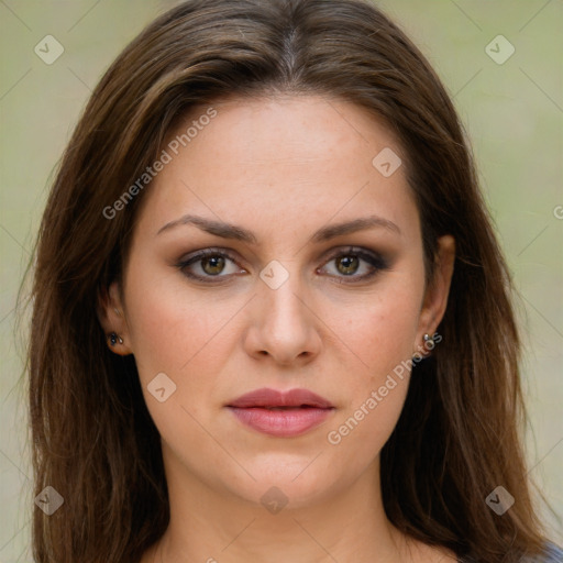 Joyful white young-adult female with long  brown hair and green eyes