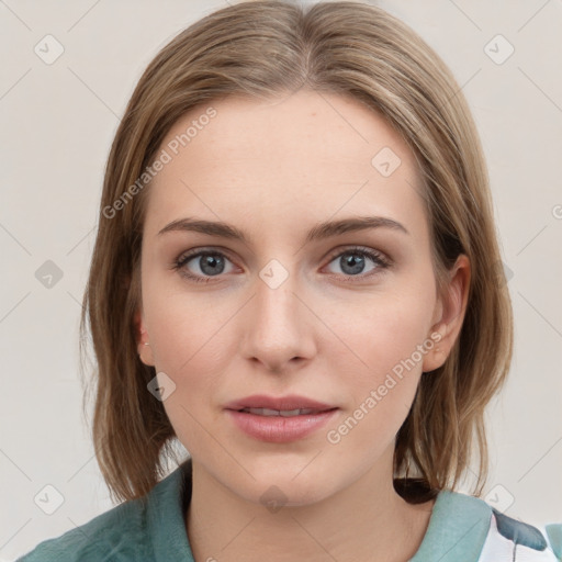 Joyful white young-adult female with medium  brown hair and blue eyes