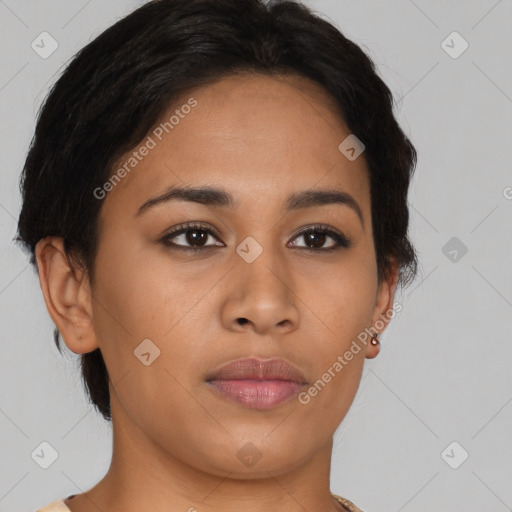 Joyful latino young-adult female with short  brown hair and brown eyes