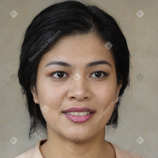 Joyful asian young-adult female with medium  black hair and brown eyes