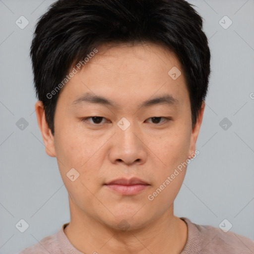 Neutral asian young-adult male with short  brown hair and brown eyes