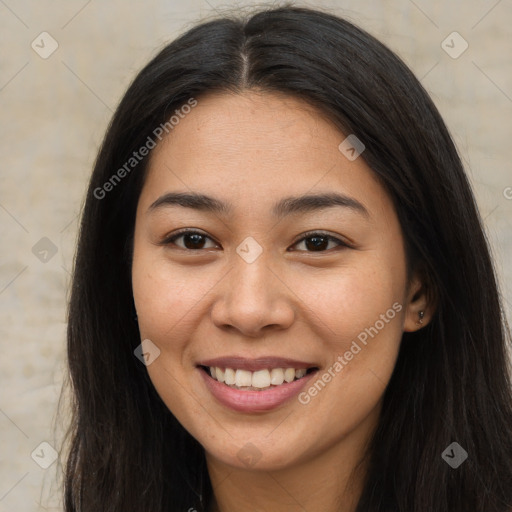 Joyful asian young-adult female with long  brown hair and brown eyes