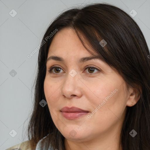 Joyful white adult female with medium  brown hair and brown eyes