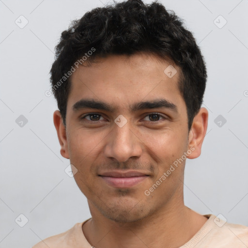 Joyful latino young-adult male with short  black hair and brown eyes