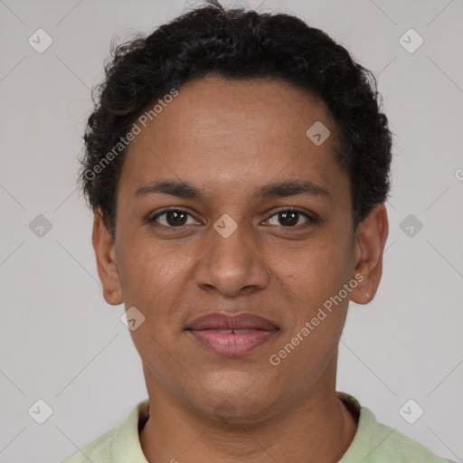 Joyful black young-adult female with short  brown hair and brown eyes