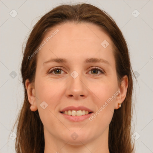 Joyful white young-adult female with long  brown hair and green eyes