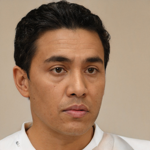 Neutral asian adult male with short  brown hair and brown eyes