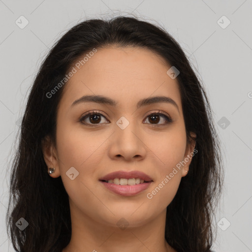 Joyful latino young-adult female with long  brown hair and brown eyes