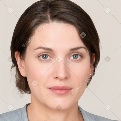 Neutral white young-adult female with medium  brown hair and grey eyes