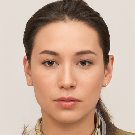 Neutral white young-adult female with short  brown hair and brown eyes