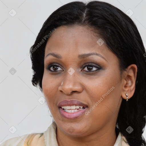 Joyful black young-adult female with medium  brown hair and brown eyes