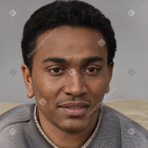 Joyful latino young-adult male with short  brown hair and brown eyes