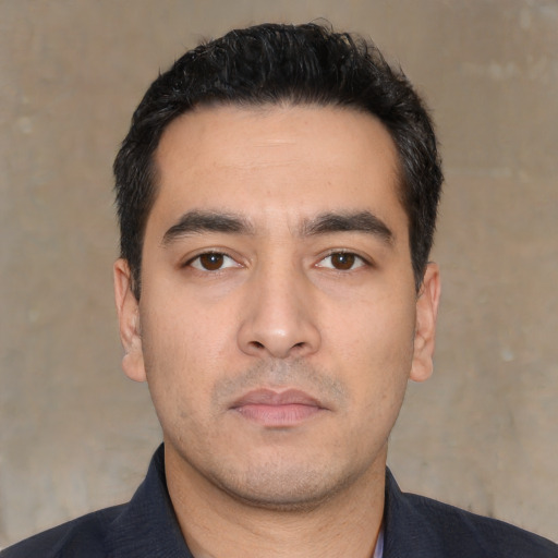 Neutral white young-adult male with short  black hair and brown eyes