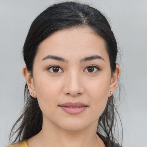 Joyful asian young-adult female with medium  brown hair and brown eyes
